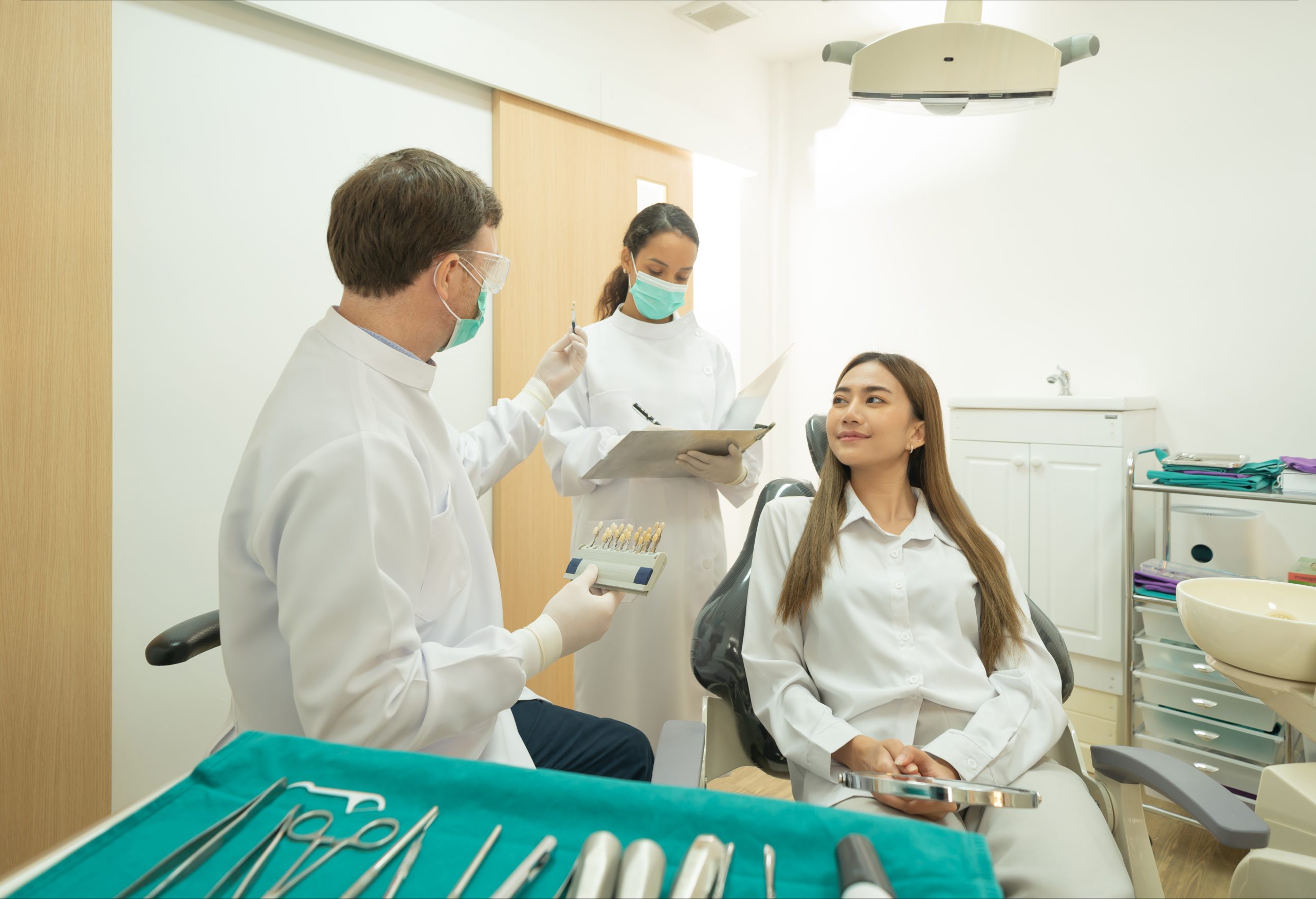 A patient discussing the longevity of dental implants at Implant & Cosmetic Dentistry of Northern Indiana, Rochester, IN; call 360-800-2013.