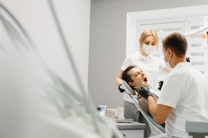 A patient learning about tooth replacement options for missing teeth at Implant & Cosmetic Dentistry of Northern Indiana, Rochester, IN; phone 360-800-2013.
